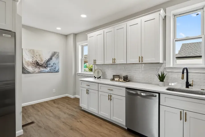Kitchen sink wall with a matte black faucet