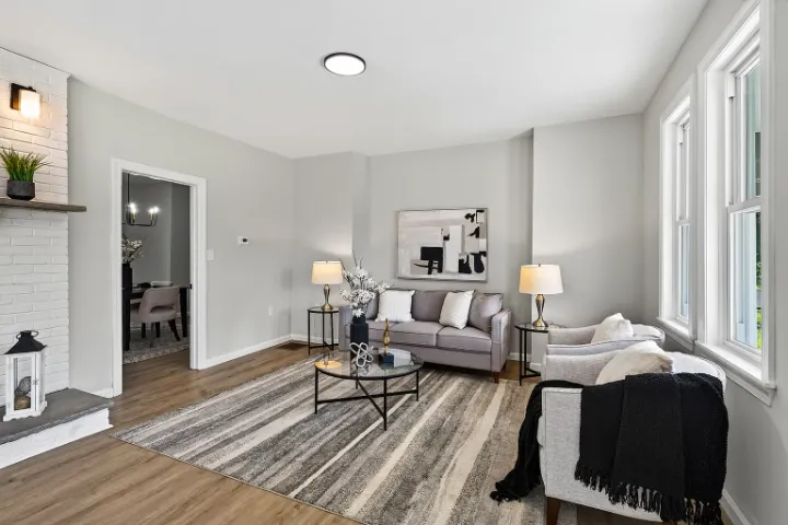 Living room with painted-brick fireplace