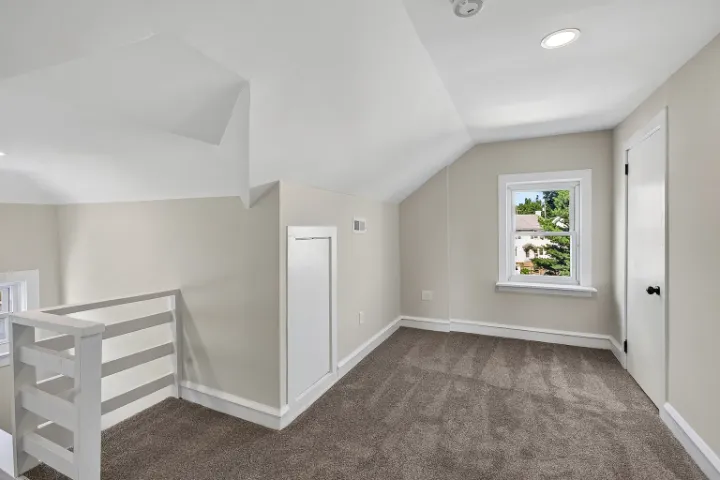 Upper loft landing with painted railing